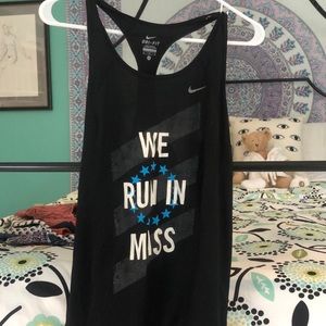 We run in mass Nike tank